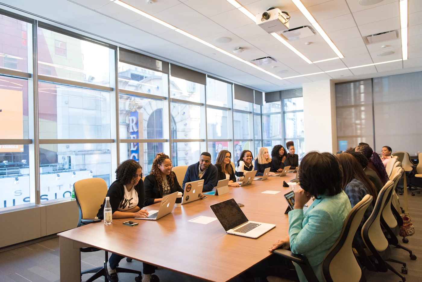Technology professionals collaborating around a table